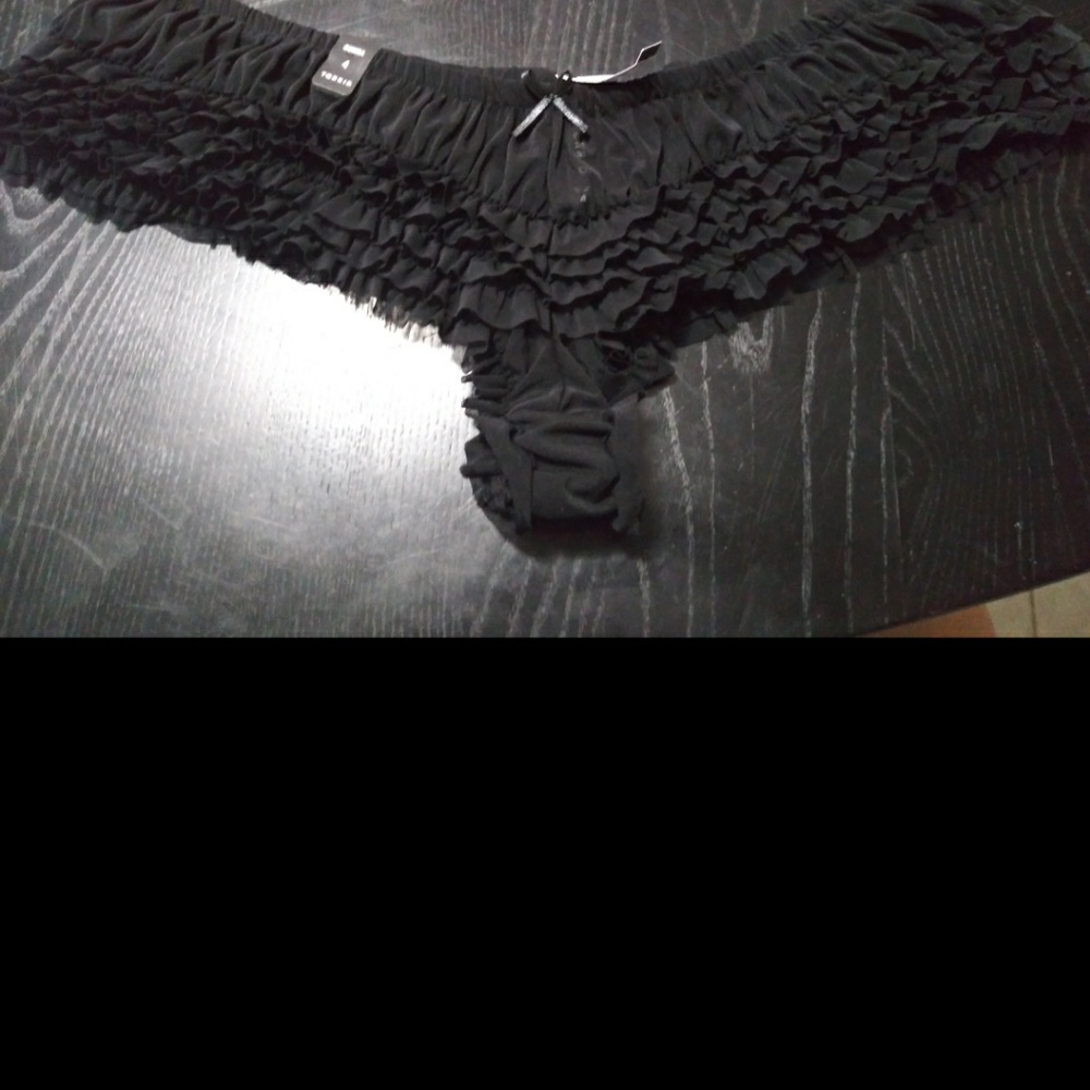 Size 4 torrid underwear new with tags thongs